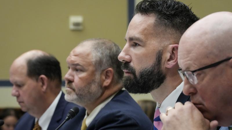 WASHINGTON, DC - JULY 19: (L-R) Flanked by their counsel, Supervisory IRS Special Agent Gary Shapley and IRS Criminal Investigator Joseph Ziegler testify during a House Oversight Committee hearing related to the Justice Department's investigation of Hunter Biden, on Capitol Hill July 19, 2023 in Washington, DC. The committee heard testimony from two whistleblowers from the Internal Revenue Service who allege that the Hunter Biden criminal probe was mishandled by the Department of Justice.